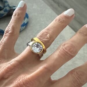 Elegant Gold and Silver Ring with Purple Stone